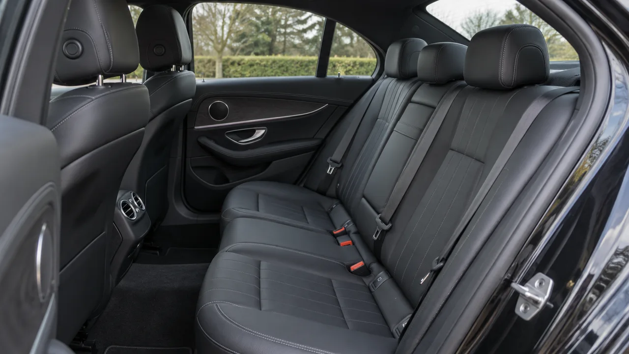 Illustrative executive-class rear passenger cabin; actual vehicles vary